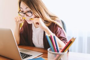 a student with a laptop